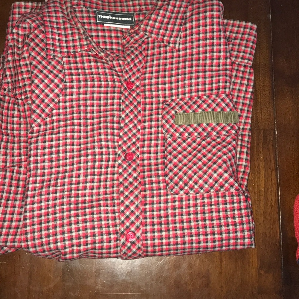 the hundreds button up